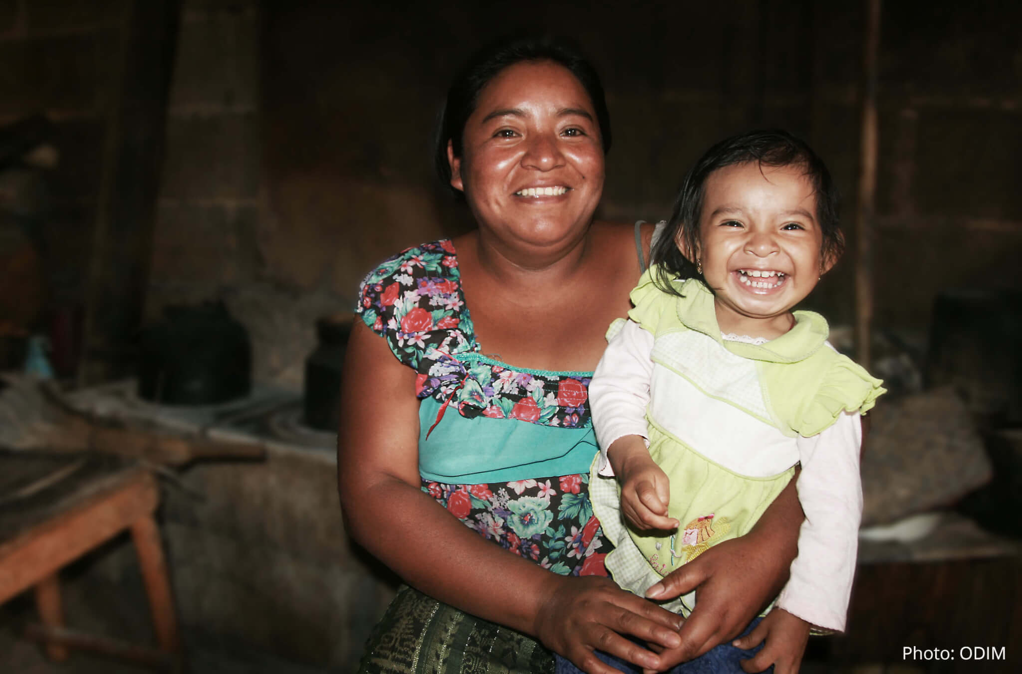 mother and child smiling