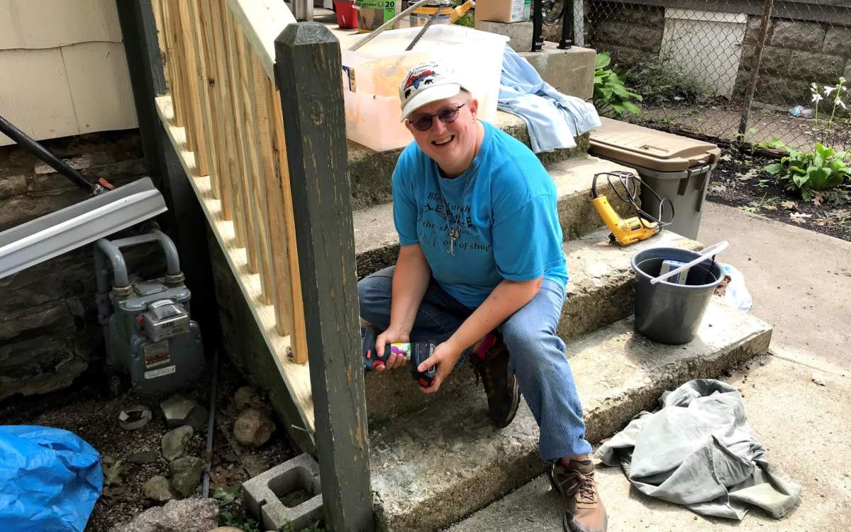 person repairing steps